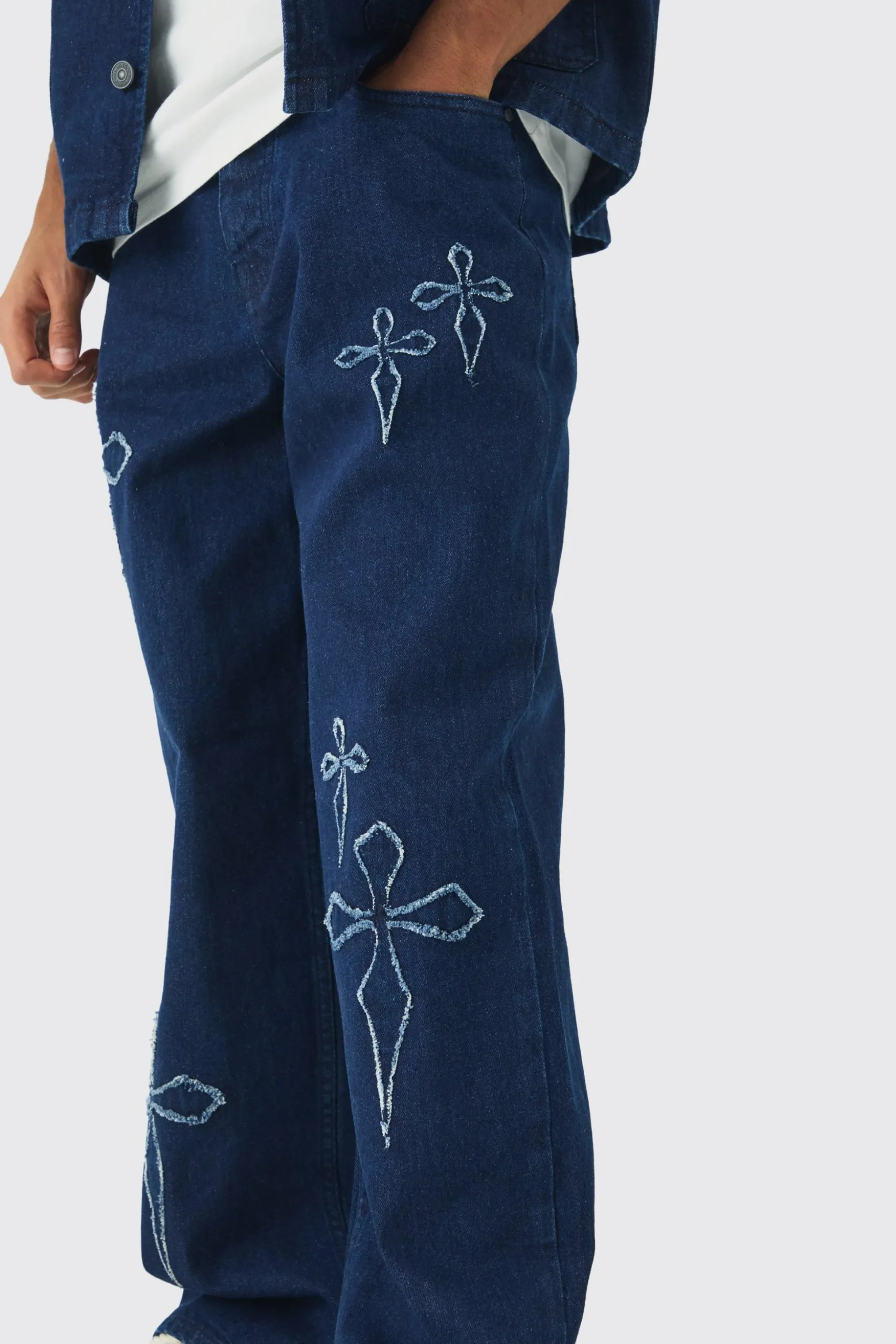 Baggy Fit Raw Edge Denim Cross Applique Jeans | BoohooMAN UK