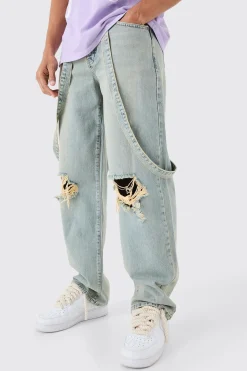 Baggy Rigid Strap Detail Ripped Knee Jeans In Antique Blue | BoohooMAN UK