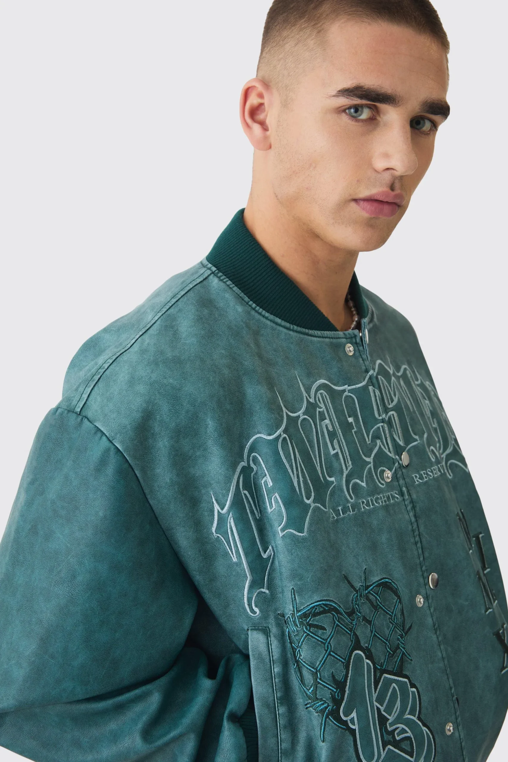 Boxy Tonal Badge Tumbled Pu Varsity Jacket In Blue | BoohooMAN UK