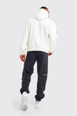 Elasticated Waist Multi Pocket Zip Cargo Trouser | BoohooMAN UK