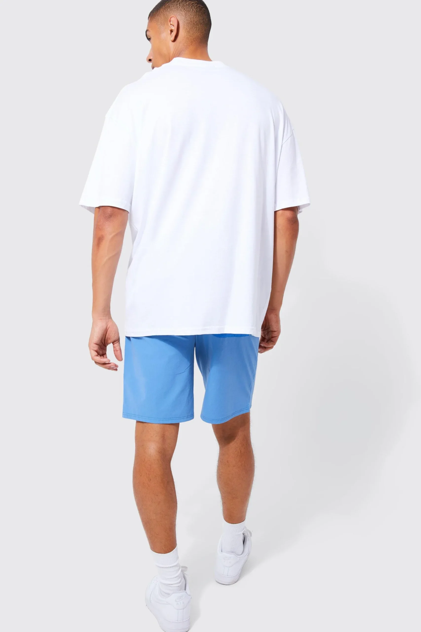 Elasticated Waist Relaxed Fit Branded Colour Block Cargo Shorts | BoohooMAN UK