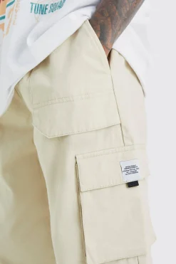 Elasticated Waist Relaxed Fit Buckle Cargo Jogger | BoohooMAN UK