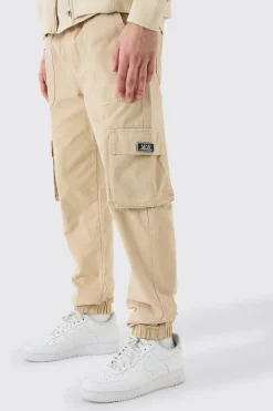 Elasticated Waist Slim Fit Badge Cargo Jogger | BoohooMAN UK