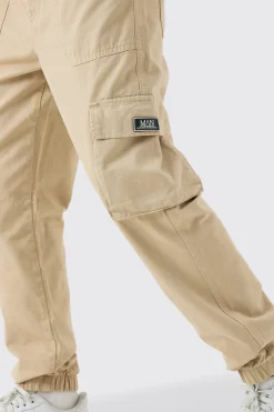 Elasticated Waist Slim Fit Badge Cargo Jogger | BoohooMAN UK