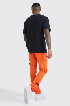 Elasticated Waist Slim Multi Cargo Strap Trouser | BoohooMAN UK
