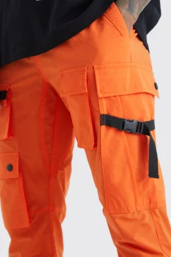 Elasticated Waist Slim Multi Cargo Strap Trouser | BoohooMAN UK