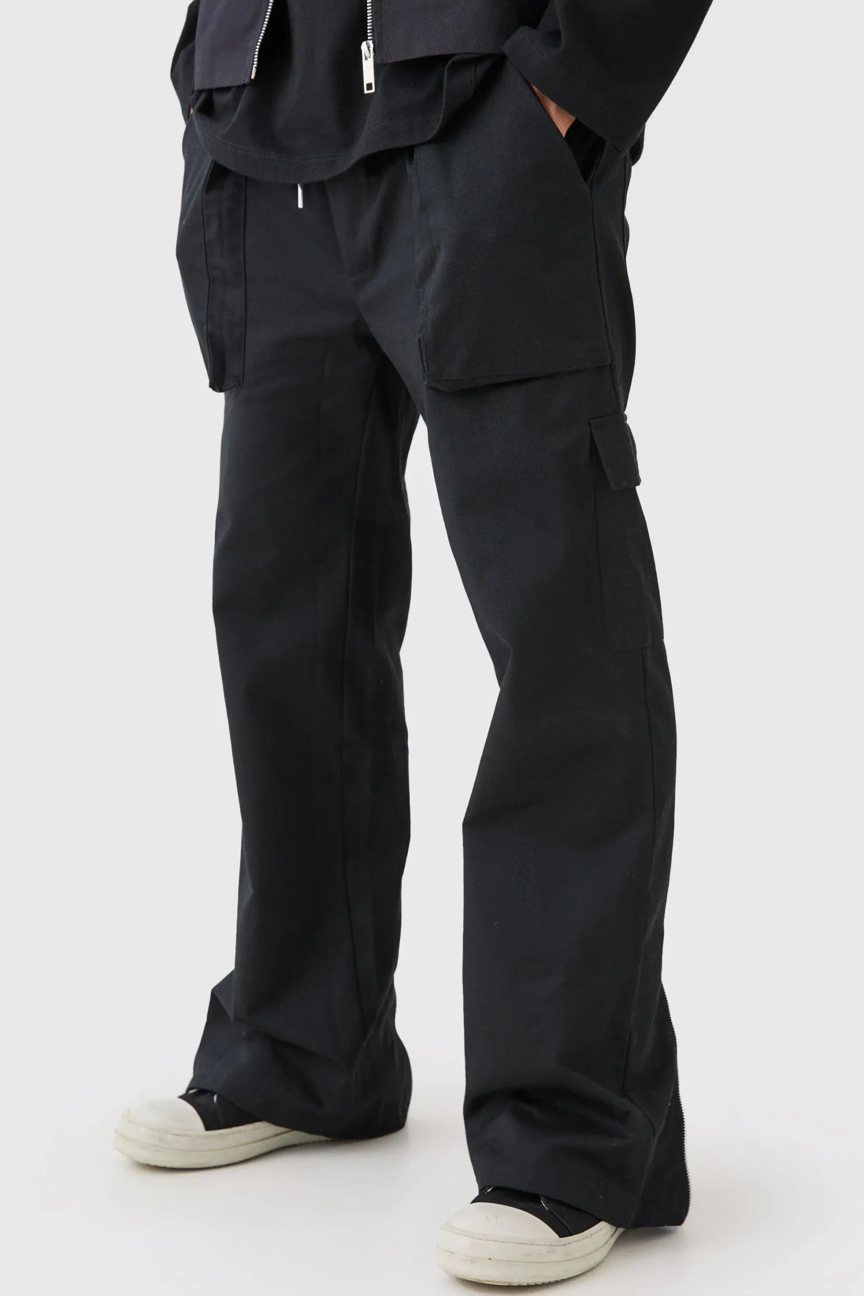 Elasticated Waist Zip Hem Flared Cargo Trousers | BoohooMAN UK