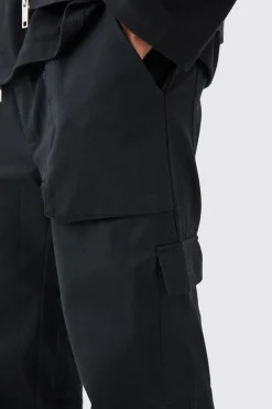 Elasticated Waist Zip Hem Flared Cargo Trousers | BoohooMAN UK
