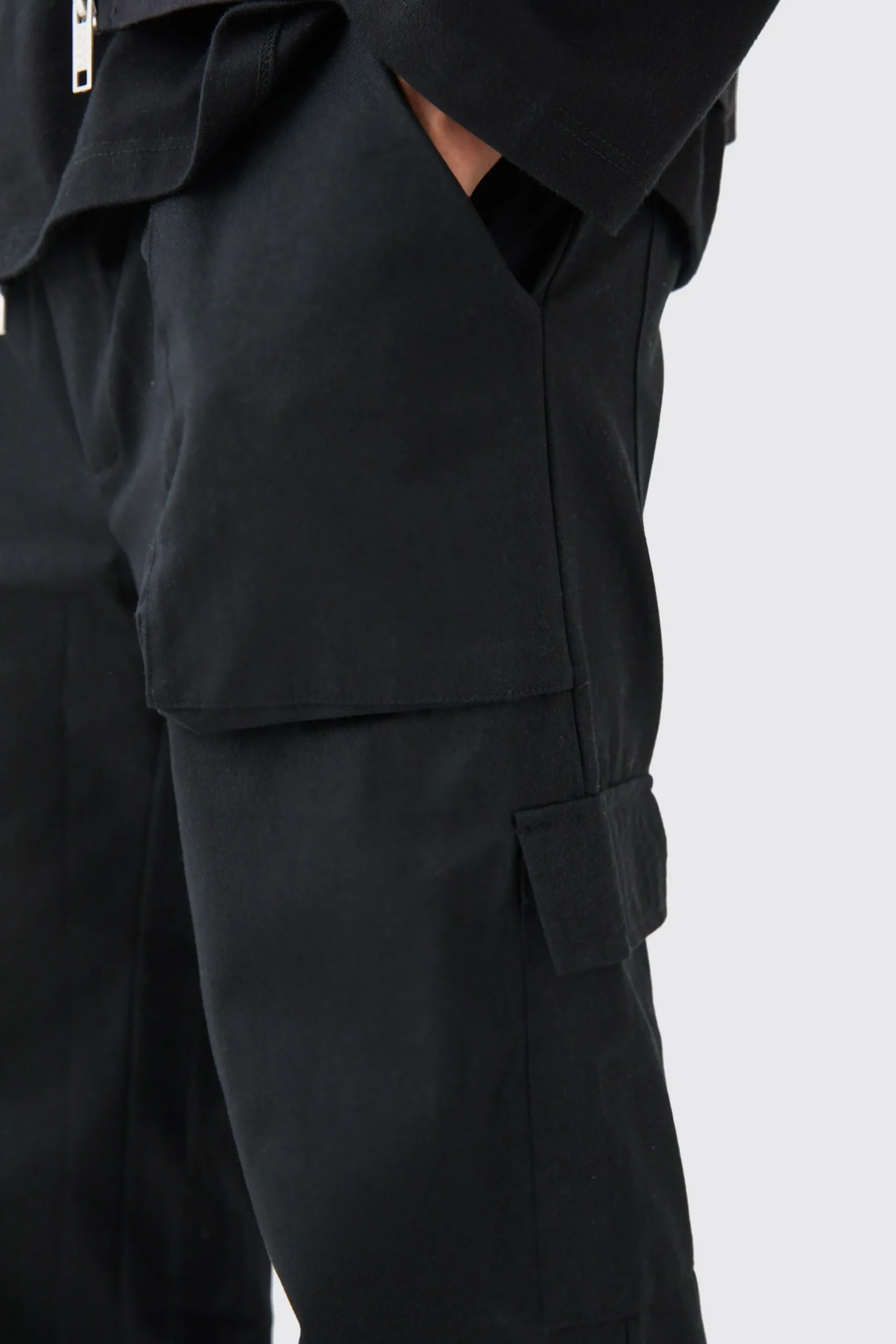 Elasticated Waist Zip Hem Flared Cargo Trousers | BoohooMAN UK