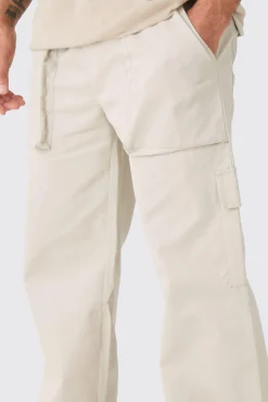 Elasticated Waist Zip Hem Flared Parachute Cargo Trousers | BoohooMAN UK