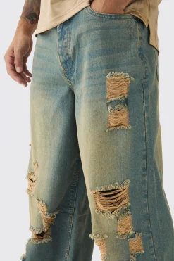 Extreme Baggy Rigid All Over Ripped Jeans | BoohooMAN UK