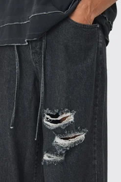 Extreme Baggy Rigid Ripped Jeans With Belt Detail | BoohooMAN UK