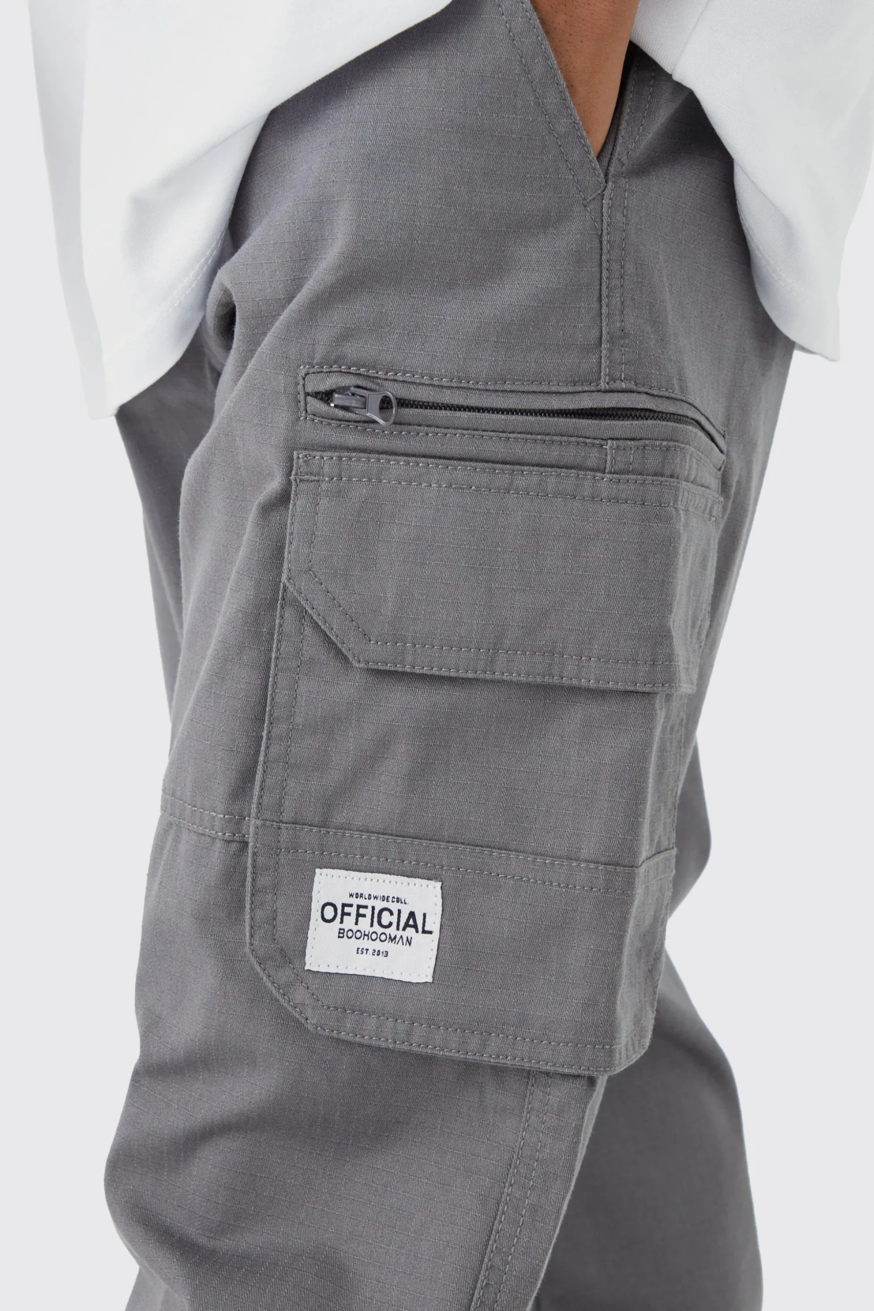 Fixed Ripstop Cargo Zip Trouser With Woven Tab | BoohooMAN UK