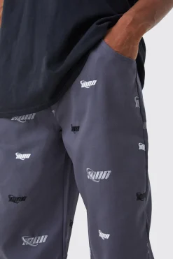 Fixed Waist Relaxed All Over Embroidery Trouser | BoohooMAN UK