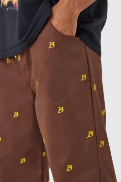 Fixed Waist Relaxed All Over Embroidery Trouser | BoohooMAN UK