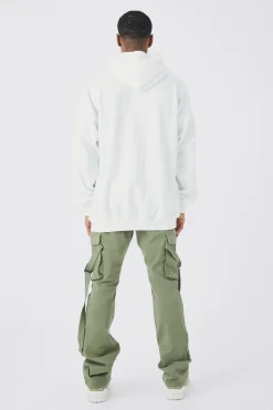 Fixed Waist Slim Stacked Flare Strap Cargo Trouser | BoohooMAN UK