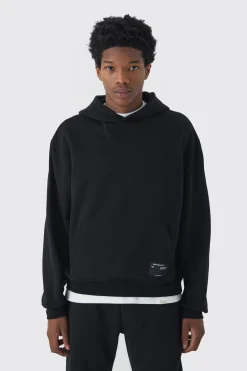 330GSM Oversized Boxy Over The Head Hoodie With Woven Branding | BoohooMAN UK