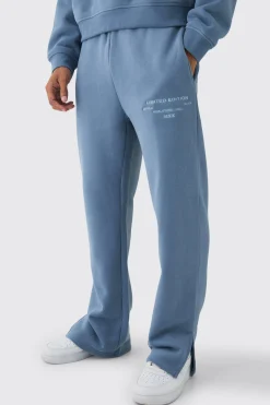 330GSM Regular Fit Split Hem Jogger With Woven Badge | BoohooMAN UK