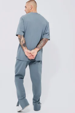 Heavyweight Embossed New York Baseball Tracksuit | BoohooMAN UK