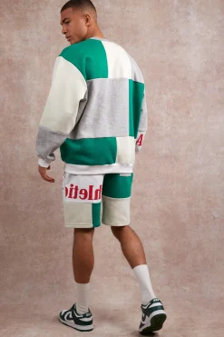 Loose Fit Graphic Patchwork Jersey Shorts | BoohooMAN UK