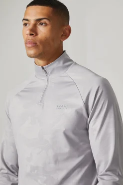 Man Active Camo Print Regular Fit 1/4 Zip Top | BoohooMAN UK