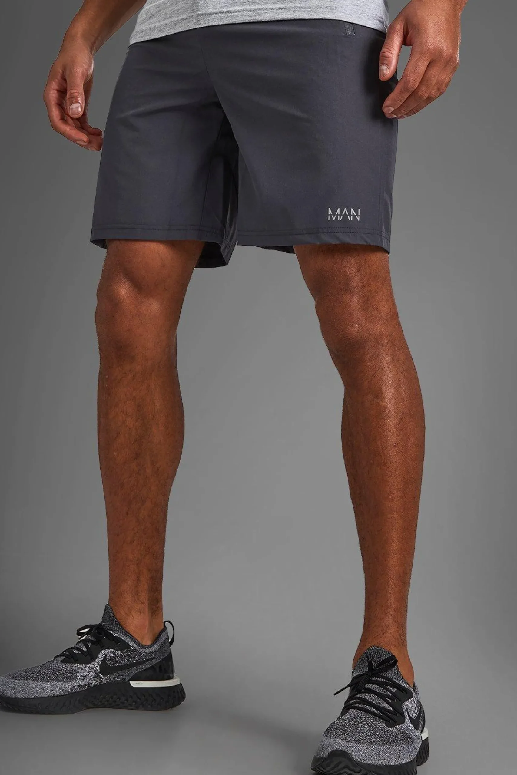 Man Active Gym Zip Pocket Regular Fit 5inch Shorts | BoohooMAN UK