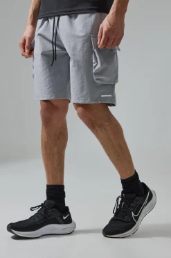 Man Active 5inch Oversized Reflective Cargo Short | BoohooMAN UK