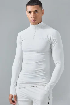 Man Active Muscle Fit 1/4 Zip Top | BoohooMAN UK