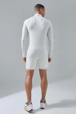 Man Active Muscle Fit 1/4 Zip Top | BoohooMAN UK
