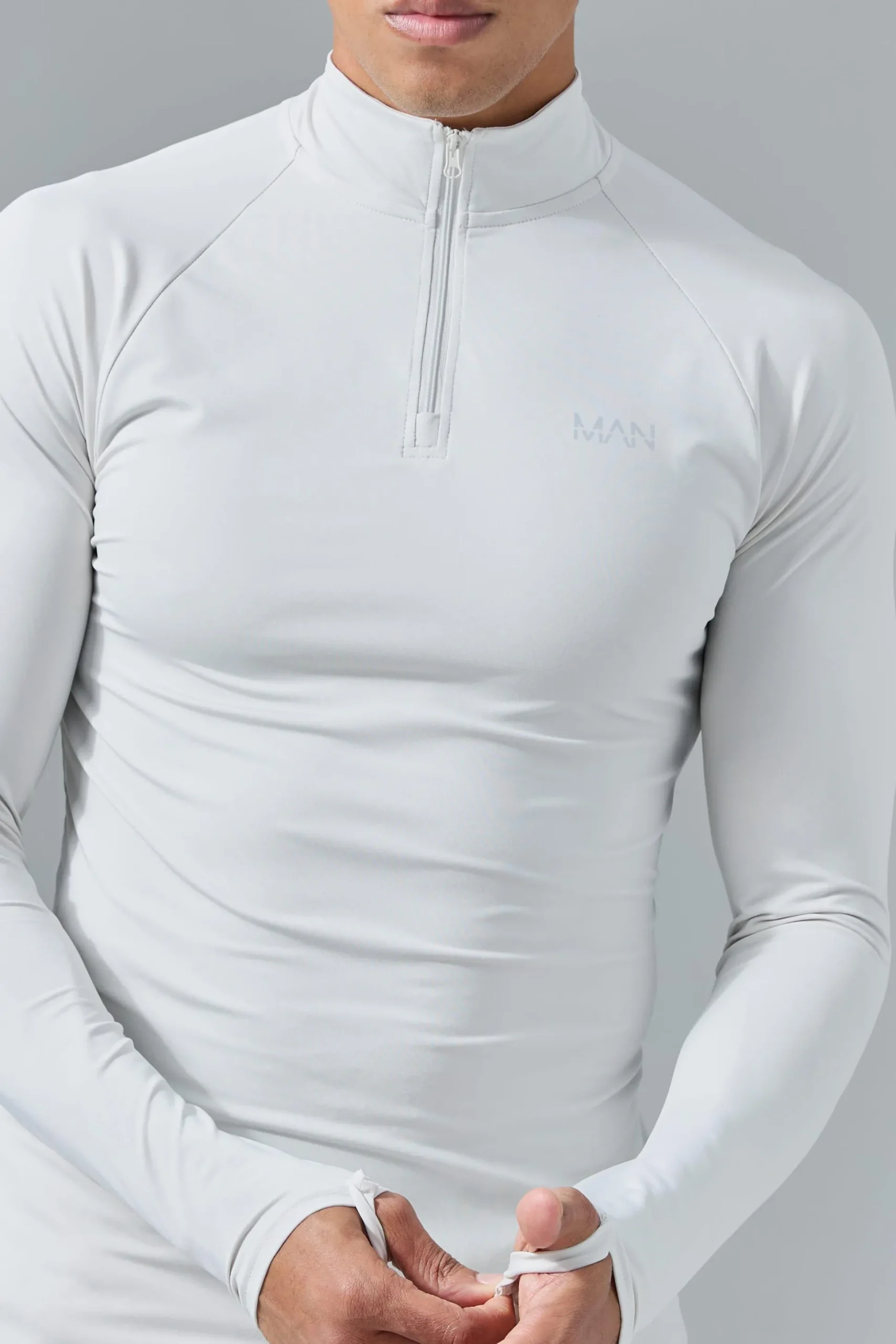 Man Active Muscle Fit 1/4 Zip Top | BoohooMAN UK