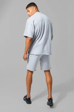 Man Active Oversized Acid Wash Raw T-shirt | BoohooMAN UK