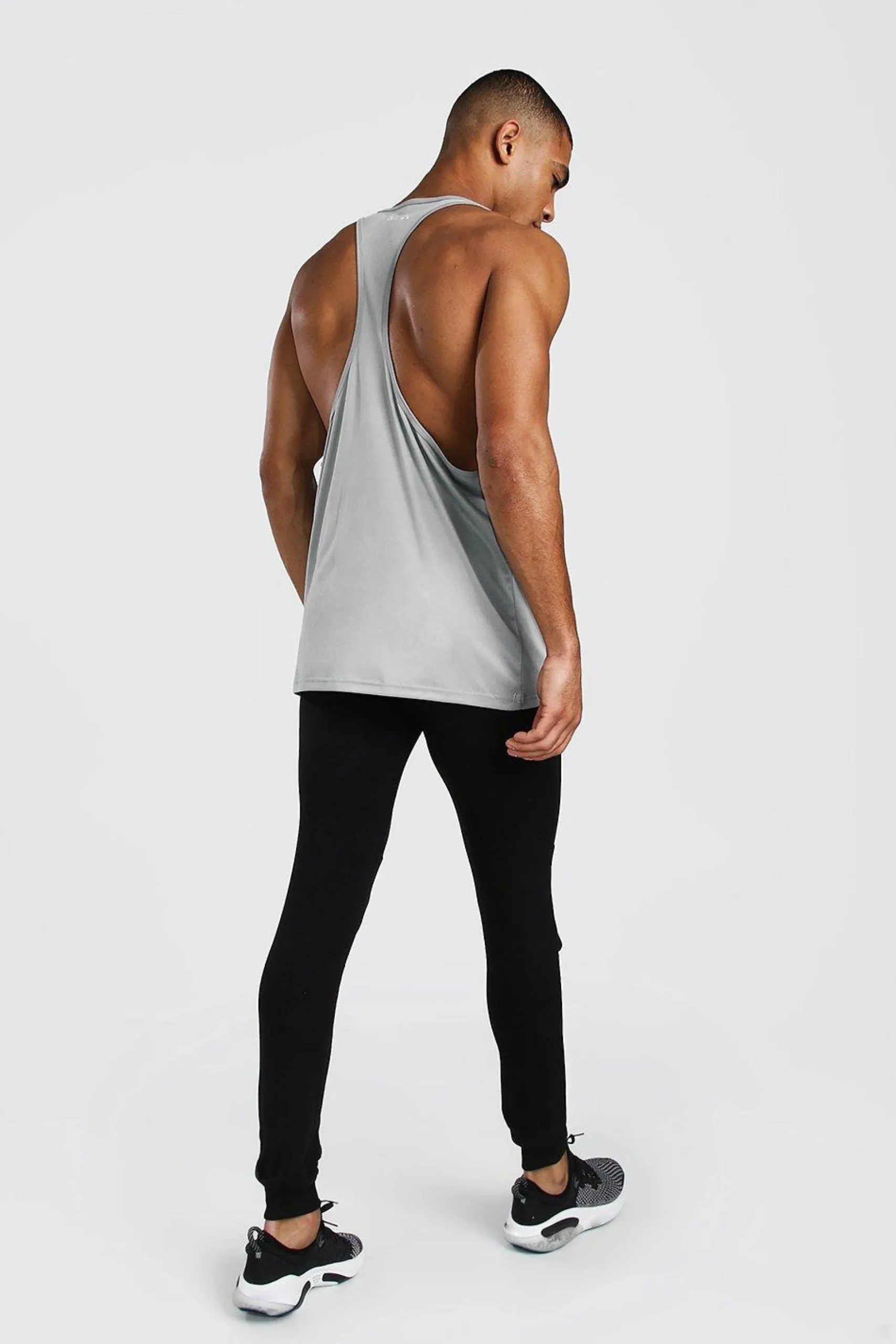 Man Active Poly Gym Regular Fit Racer Vest | BoohooMAN UK