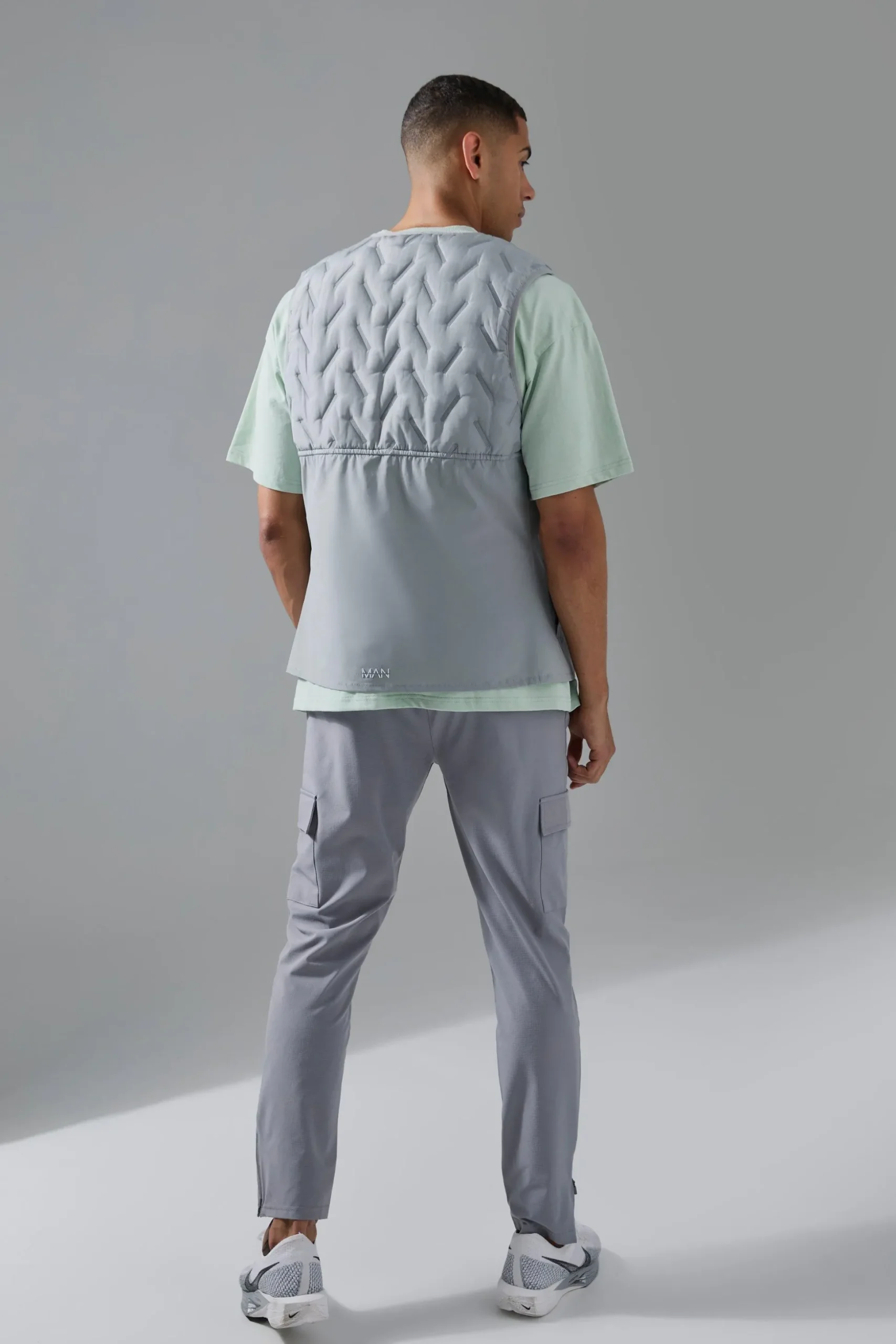 Man Active Quilted Gilet | BoohooMAN UK