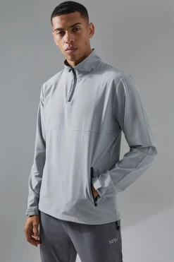 Man Active Shower Resist 1/4 Zip Funnel Neck Windbreaker | BoohooMAN UK