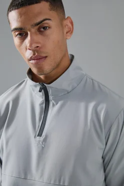 Man Active Shower Resist 1/4 Zip Funnel Neck Windbreaker | BoohooMAN UK