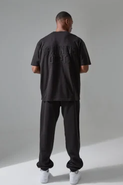 Man Active Training Dept Oversized Embossed T-shirt | BoohooMAN UK