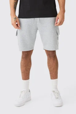Man Dash Loose Fit Mid Length Cargo Short | BoohooMAN UK