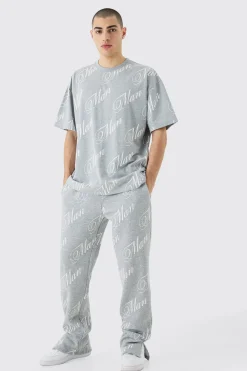 Man Script All Over Print Split Hem Tshirt & Jogger Set | BoohooMAN UK