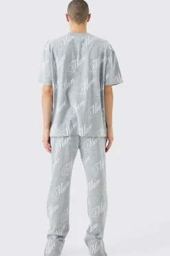 Man Script All Over Print Split Hem Tshirt & Jogger Set | BoohooMAN UK