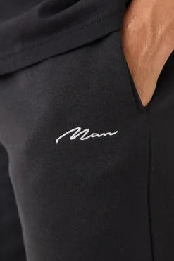 Man Signature Loose Fit Mid Length Shorts | BoohooMAN UK
