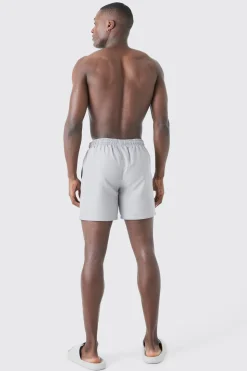 Man Signature Mid Length Swim Short | BoohooMAN UK