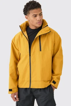 Man Tab Oversized Zip Detail Nylon Windbreaker In Mustard | BoohooMAN UK