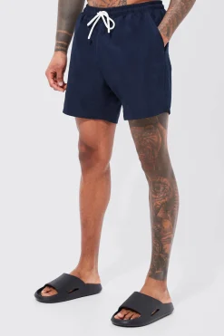 Mid Length Plain Swim Shorts | BoohooMAN UK