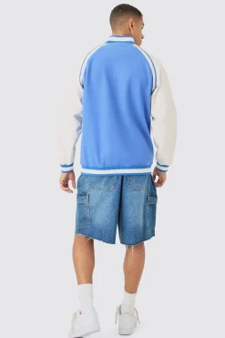 Official Badge Raglan PU Sleeve Varsity Jacket In Light Blue | BoohooMAN UK