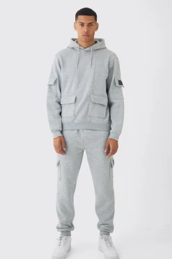 Official Man Regular Fit Panelled Cargo Hooded Tracksuit | BoohooMAN UK
