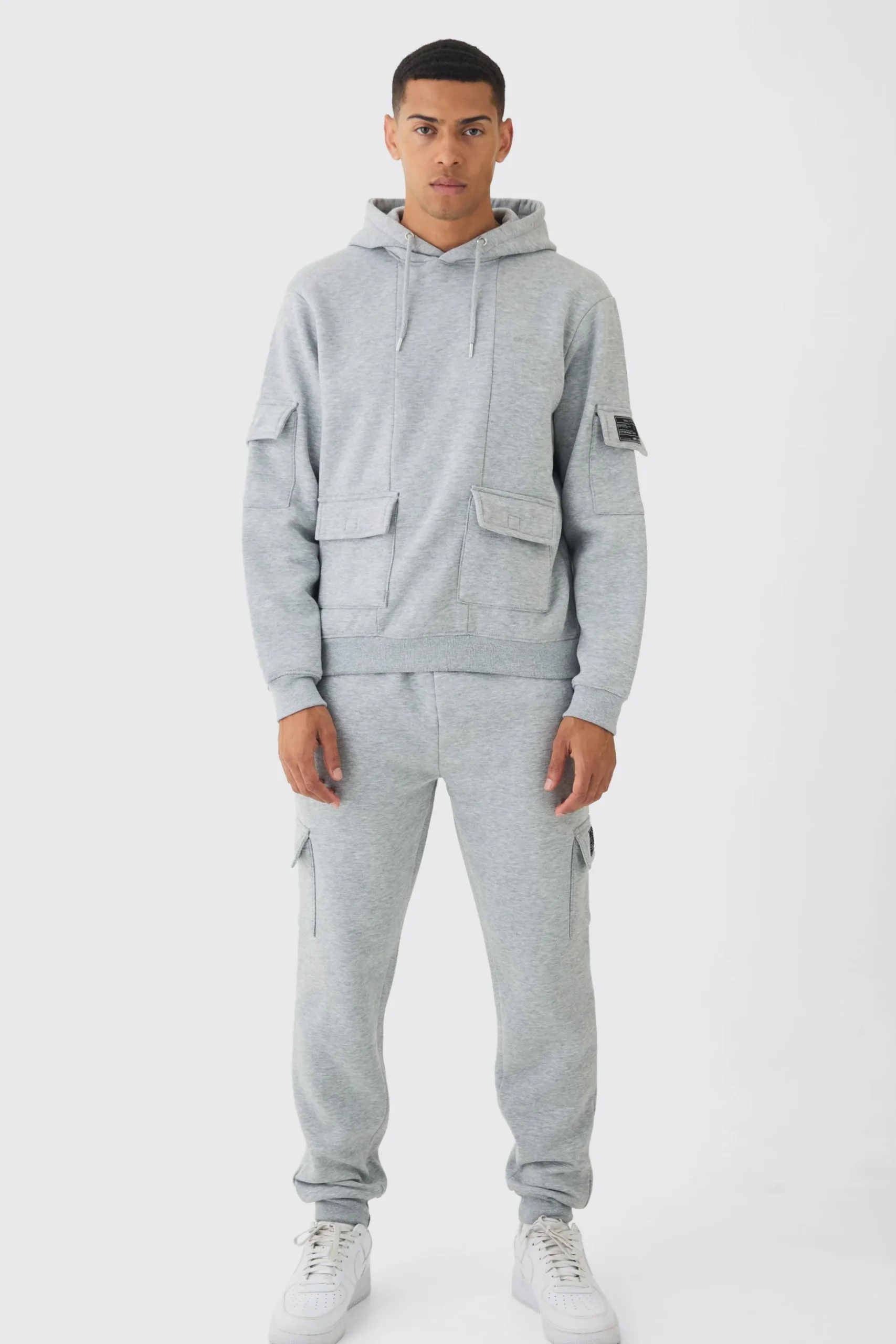 Official Man Regular Fit Panelled Cargo Hooded Tracksuit | BoohooMAN UK