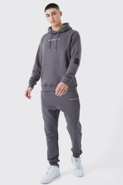 Official Man Tape Hooded Tracksuit | BoohooMAN UK