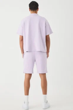 Oversized 1/4 Zip Embroidered Polo And Short Set | BoohooMAN UK