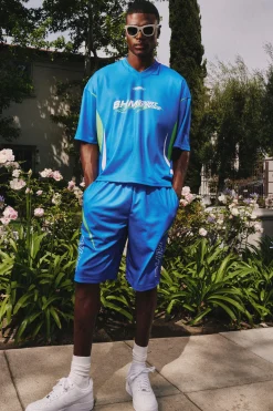 Oversized Boxy V Neck Mesh Moto Printed T-shirt & Short Set | BoohooMAN UK