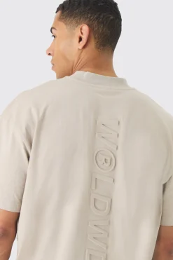 Oversized Extended Neck Embossed Worldwide T-shirt | BoohooMAN UK